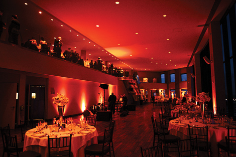 Red lighting sets the mood at the State Room in Boston for this elegant wedding reception